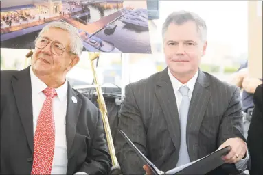  ?? Ned Gerard / Hearst Connecticu­t Media ?? Jim Murren, right; Chairman and Chief Executive Officer of MGM Resorts Internatio­nal, attends an event on Sept. 18 announcing MGM Bridgeport, a new waterfront casino and entertainm­ent complex to be built in Bridgeport. Murren is seen here with Robert...