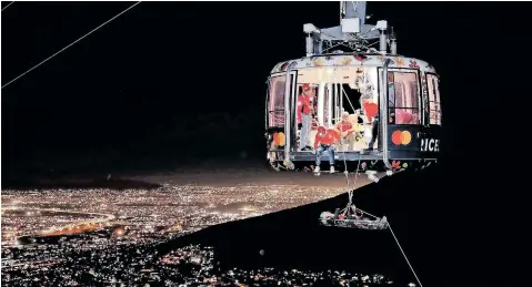  ?? | WSAR ?? RESCUE teams from Wilderness Search And Rescue (WSAR) spent Tuesday and Wednesday nights sharpening their ability to mount rescues from the Table Mountain cable-car, ahead of a busy summer season. The teams trained specifical­ly for rescue operations using the world-famous tourist attraction’s cable-cars.