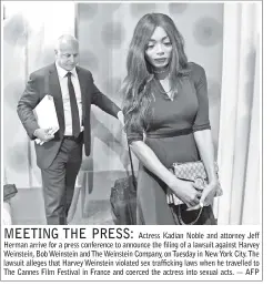  ??  ?? Actress Kadian Noble and attorney Jeff Herman arrive for a press conference to announce the filing of a lawsuit against Harvey Weinstein, Bob Weinstein and The Weinstein Company, on Tuesday in New York City. The lawsuit alleges that Harvey Weinstein...