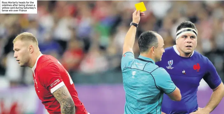  ??  ?? Ross Moriarty heads for the sidelines after being shown a yellow card during Saturday’s tense win over France