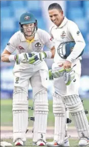  ?? GETTY IMAGES ?? Australia skipper Tim Paine (left) and Usman Khawaja held firm for 36.2 overs.