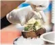  ?? SUN SENTINEL ?? Chef Kevin Baker prepares coconut shell ceviche at Steelpan Kitchen & Bar.