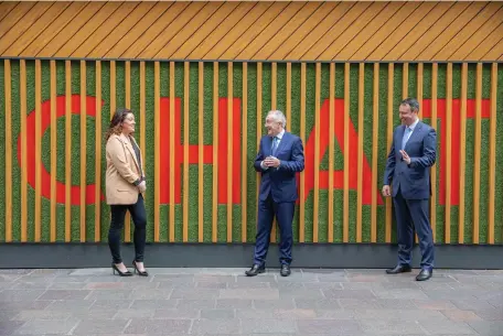  ??  ?? Talking shop: Lorraine Rabbitte, Spar retailer, Leo Crawford, group CEO, BWG, and John O’Neill, Spar retailer, outside the relaunched Spar Millennium Walkway store in Dublin city