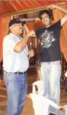  ??  ?? The filmmaker has fun with Stephen Gomes, the sound engineer on the sets of Jaane Tu... Ya Jaane Na, for which he was the second assistant director