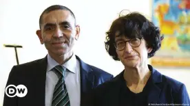  ??  ?? German scientists Ugur Sahin (L) and Ozlem Tureci (R) argue lockdowns will no longer be needed by the autumn