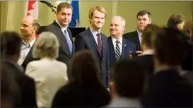  ?? Herald photo by Ian Martens ?? Candidates Rick Peterson, left, Andrew Scheer, Chris Alexander, Erin O'Toole and Pierre Lemieux stand with fellow candidates after parading in at the start of federal Progressiv­e Conservati­ve leadership forum Thursday evening at the Lethbridge Lodge....