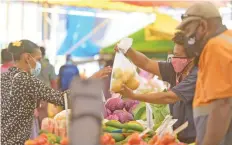  ?? Photo: Ronald Kumar ?? A market vendor uses plastic bag at Suva market on 24 September, 2021.