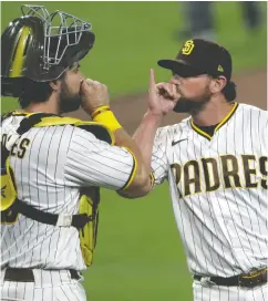  ?? GREGORY BULL / THE ASSOCIATED PRESS FILES ?? Reliever Kirby Yates, seen with the Padres, is reportedly
joining the Toronto Blue Jays’ pitching staff.