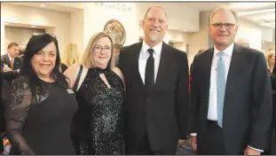  ?? ?? Sandy Robinson and Margaret and Bob Long, all of Fayettevil­le; and Nat Lea