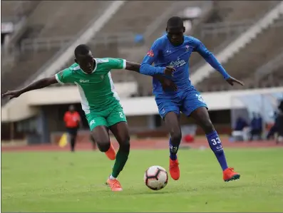  ??  ?? Dynamos striker Newman Sianchali (right) and Caps United’s Tanaka Tafa tussle for ball possession in a Chibuku Super Cup match played at the National Sports Stadium in Harare early this month