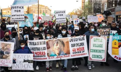  ?? Photograph: Ashlee Rezin Garcia/AP ?? People march on 16 April 2021 near Mayor Lori Lightfoot's home to protest about the fatal shooting by Chicago police of 13-year-old Adam Toledo.