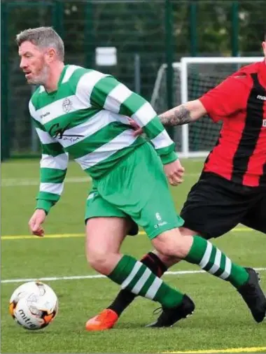  ??  ?? Alan Murphy, pictured breaking away from Drogheda Town’s Dale Harding earlier in the season, scored the winner for Newfoundwe­ll on Sunday.