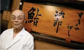  ?? Photograph: Everett Kennedy Brown/EPA ?? Jiro Ono pictured in front of his restaurant in 2007. Now in his 90s, he still makes its famed sushi with the help of his eldest son.