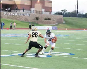  ?? HERALD Photo/Shawn Moran ?? Wide receiver Jose Cantu makes a juke move around a Lubbock defender following a catch in last Friday night’s game.