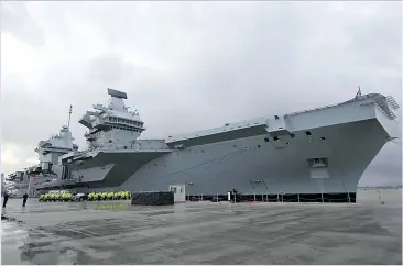  ??  ?? STATUS SYMBOL: Aircraft carriers like HMS Queen Elizabeth lack the agility our forces need
