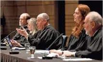  ?? DAVID BORDEWYK/ SOUTH DAKOTA NEWS WATCH ?? South Dakota Chief Justice Steven Jensen ask questions during a Supreme Court hearing in Brookings on March 23.