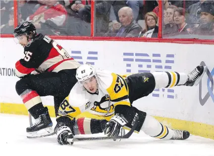  ?? THE CANADIAN PRESS ?? Erik Karlsson and the Sens know you can’t shut down Sidney Crosby, so they’ll simply try to keep a lid on his scoring chances.