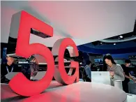  ?? VCG ?? 7 de diciembre de 2018. La reunión de socios del mundo de China Mobile 2018 se inaugura en Guangzhou en la que se exponen móviles de 5G.