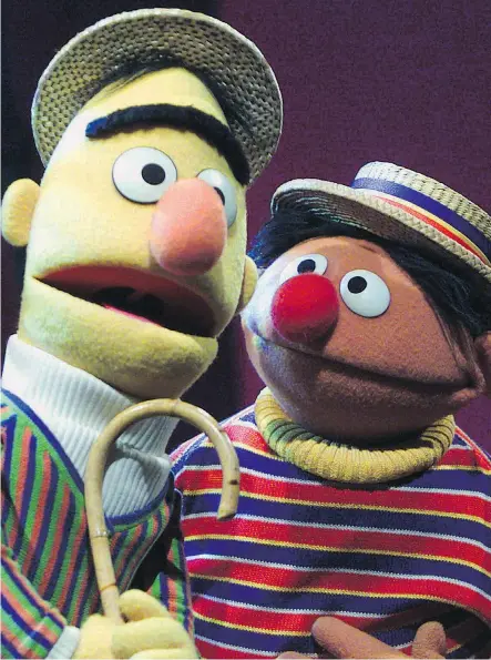  ?? BETH A. KEISER/ THE ASSOCIATED PRESS/ FILES ?? In keeping with the social conscience exhibited by adorable and unassuming puppets throughout history, Sesame Street favourites Bert, left, and Ernie came out in favour of gay marriage on the cover of The New Yorker.