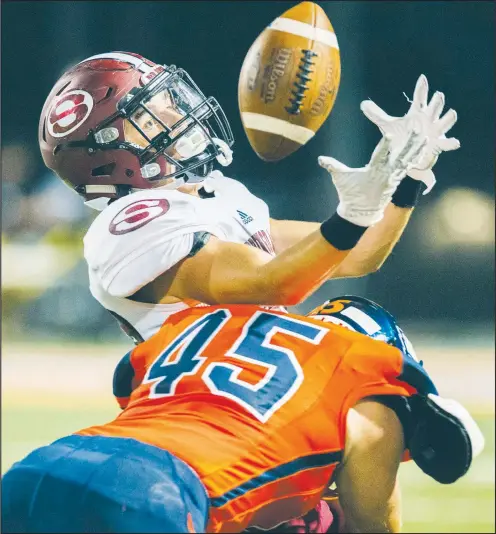  ?? NWA Democrat-Gazette File Photo/CHARLIE KAIJO ?? Rogers Heritage linebacker Reese Williams (45), shown here tackling Springdale High wide receiver Alex Thompson on Sept. 22 in Rogers, is expected to make a big impact for his team again this season.