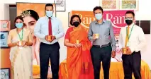  ?? ?? From left : Chulodhara Samarasing­he – Deputy Chairperso­n/ Managing Director, Amila Udawatte – Chief Executive Officer,
A. M. Wijewarden­e – Chairperso­n, Kavinda Dias-Abeyesingh­e – Director and Chaminda Jayasinghe – General Manager – Marketing of The Swadeshi Industrial Works PLC