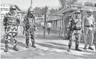  ??  ?? File [photo: Indian security forces stand guard (HT)