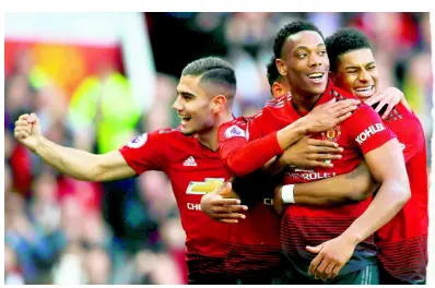 ?? AP ?? Manchester United’s Anthony Martial (centre) celebrates scoring his side’s second goal during the English Premier League match between Manchester United and Watford at Old Trafford Stadium yesterday.