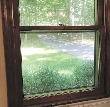  ??  ?? Antique double-hung windows used rope and steel weights to counterbal­ance the sashes. Modern windows — including ones made in the 1980s — usually depend on spring balances that fit tightly into the jambs.