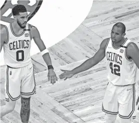  ?? PAUL RUTHERFORD/USA TODAY SPORTS ?? Jayson Tatum, Al Horford and the Celtics improved to 7-0 following a loss in the 2022 playoffs.