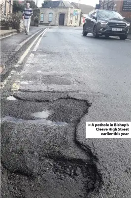  ??  ?? A pothole in Bishop’s Cleeve High Street earlier this year