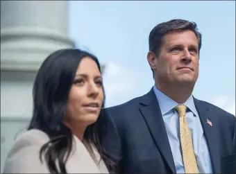  ?? BOSTON HERALD FILE PHOTOS ?? DIFFERENT DIRECTIONS: Gubernator­ial candidate Geoff Diehl, with running mate Leah Allen Cole, represents the Trump wing of the GOP, while Gov. Charlie Baker, who’s sitting the convention out, is on the party’s other wing.