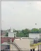  ??  ?? Locals flying kites.