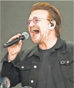 ?? CHRIS ROUSSAKIS/ AFP/GETTY IMAGES ?? Bono and U2 join other A-list acts expected to take the Grammys stage.