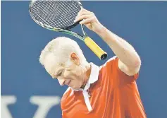  ?? — AFP photo ?? File photo of John McEnroe tossing his racket during an exhibition match.
