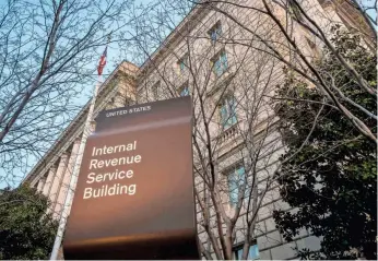  ?? J. DAVID AKE/AP FILE ?? The IRS began sending out some checks Dec. 30 and money arrived in some bank accounts as of Jan. 4. But many taxpayers are still waiting.