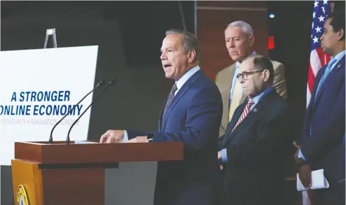  ?? J. SCOTT APPLEWHITE / THE ASSOCIATED PRESS FILES ?? From left, Rep. David Cicilline, chairman of the House Judiciary antitrust subcommitt­ee, Rep. Ken Buck, Rep. Jerrold
Nadler and Rep. Joe Neguse have led the charge in the U.S. to decentrali­ze market power for dominant tech companies.