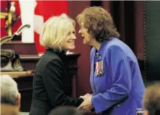  ?? LARRY WONG/EDMONTON JOURNAL ?? Lt.-Gov. Lois Mitchell, right, is congratula­ted by Premier Rachel Notley after being installed Friday at the legislatur­e.