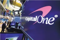  ?? RICHARD DREW/ASSOCIATED PRESS ?? The logo for Capital One Financial appears on the floor of the New York Stock Exchange. The recently disclosed breach at Capital One was one of many, including the Equifax breach in 2017 and at Presbyteri­an Health Care in May.