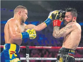  ??  ?? Vasiliy Lomachenko, left, fights Jorge Linares in May.