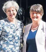  ??  ?? Theresa May and Arlene Foster yesterday