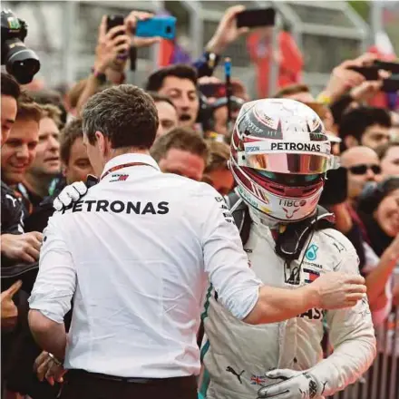  ?? REUTERS PIC ?? Mercedes driver Lewis Hamilton celebrates after winning the Azerbaijan Grand Prix yesterday.