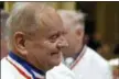  ?? PHILIPPE DESMAZES — POOL PHOTO VIA ASSOCIATED PRESS, FILE PHOTO ?? French chef Joel Robuchon attends the funeral ceremony for late French chef Paul Bocuse at the Saint-Jean cathedral, in Lyon, central France.