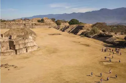  ?? Brett Gundlock photos / The New York Times ?? Visitors at the Monte Albán ruins outside of Oaxaca, Mexico. It is a vast complex of pyramids, a palace, a shrine, a ball court and a variety of carved bas-reliefs.