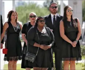  ?? MATT YORK — THE ASSOCIATED PRESS ?? Children of Sen. John McCain, R-Ariz., from back left Sidney McCain, Meghan McCain and her husband Ben Domenech, Bridgett McCain, front center and daughter-n-law Holly McCain, follow behind the casket into the Capitol rotunda for a memorial serviceat the Capitol in Phoenix.