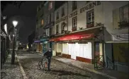  ?? MICHEL EULER / AP 2020 ?? Trying to fend off the need for a third nationwide lockdown that would further dent Europe’s secondlarg­est economy and put more jobs in danger, France is instead opting for creeping curfews.