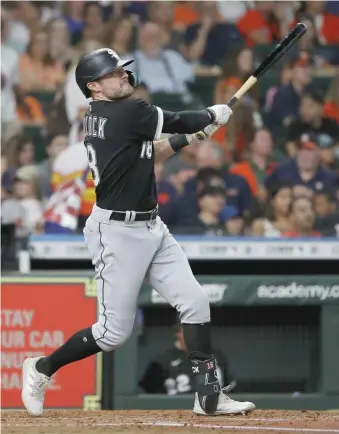  ?? BOB LEVEY/GETTY IMAGES ?? The Sox’ AJ Pollock belts a three-run homer to tie the score 3-3 in the third inning Friday night.