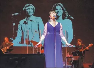  ?? Sal Gomez Photograph­y ?? MICHELLE BERTING Brett and band perform at the Downey Theatre as part of the celebratio­n.