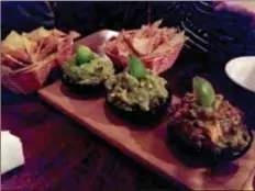  ?? Mark Meszoros/MMeszoros@News-Herald.com ?? The guacamole sampler at El Carnicero features a choice of three of the restaurant's four concoction­s and a ton of housemade chips.