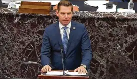 ?? CONGRESS.GOV VIA GETTY IMAGES / TNS ?? In this screenshot taken from a congress.gov webcast, Rep. Eric Swalwell (D-Calif.) speaks on Feb. 10 during former President Donald Trump’s impeachmen­t trial in Washington. Trump was acquitted, and now Swalwell, who was a House impeachmen­t manager, has filed a lawsuit against Trump and others.