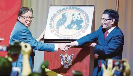  ?? PIC BY NADIM BOKHARI ?? Sarawak Chief Minister Datuk Patinggi Abang Johari Abang Openg (left) at the Sarawak-China Business Forum 2018 in Kuching yesterday.